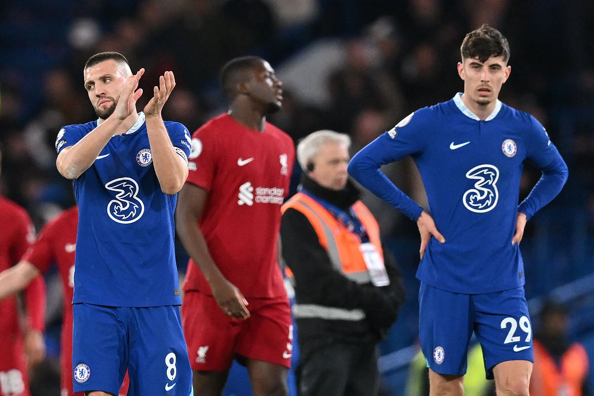 Chelsea's Croatian midfielder Mateo Kovacic (L) and German midfielder Kai Havertz (R) react after the English Premier League match between Chelsea and Liverpool at Stamford Bridge in London on 4 April 2023