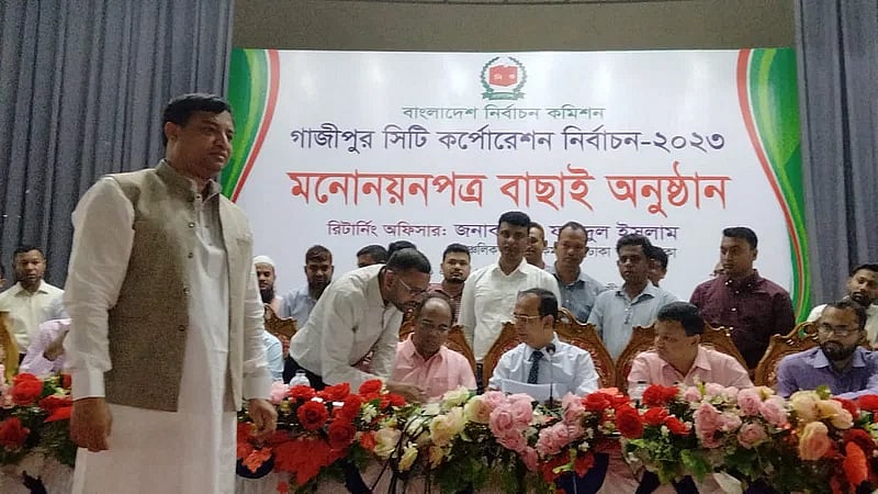 Former mayor Jahangir Alam watches nomination papers for the Gazipur City Corporation election being sorted on 30 April 2023