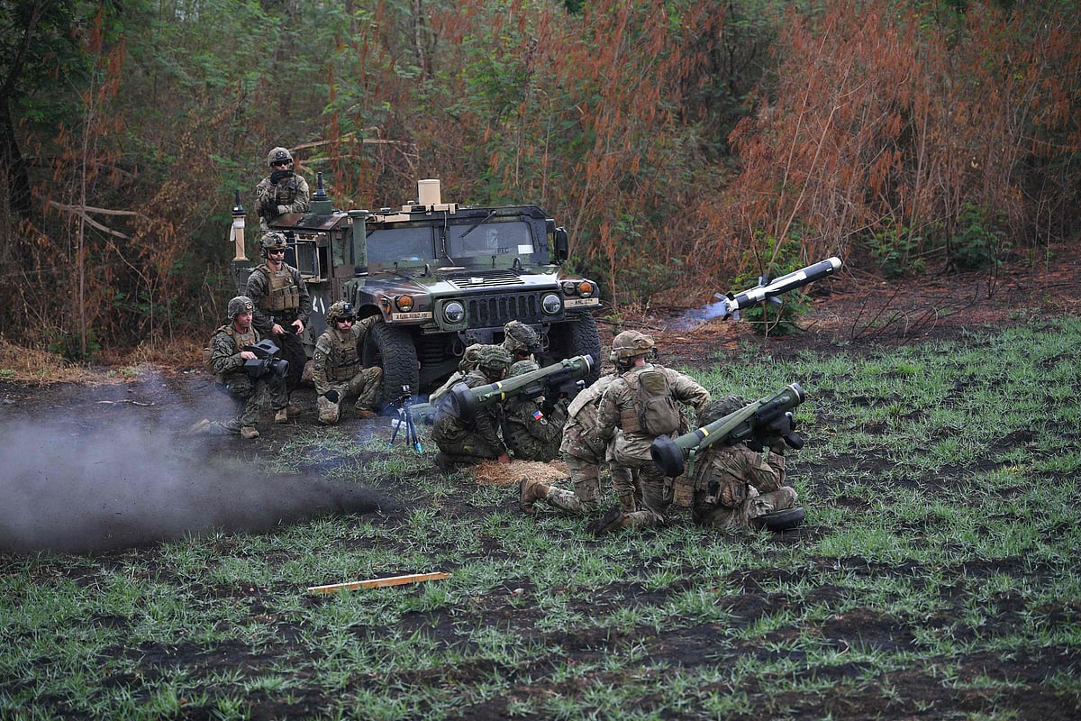 A Philippine soldier (C) fires a Javelin anti-tank weapon system during the live exercise as part of the US-Philippines joint military exercise “Balikatan” at Fort Magsaysay in Nueva Ecija province, north of Manila on 13 April, 2023
