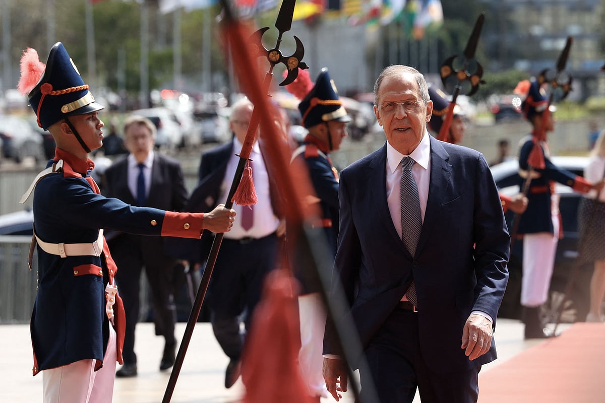 Russian Foreign Minister Sergei Lavrov reviews the guard of honour upon his arrival at Itamaraty Palace to meet his Brazilian counterpart Mauro Vieira in Brasilia on April 17, 2023