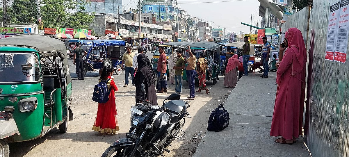 People stranded at a bus stand as no bus was leaving for Khulna from Kushtia due to the strike.