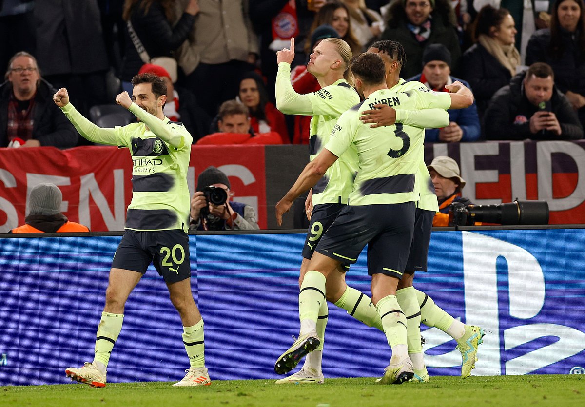 Manchester City's Erling Braut Haaland celebrates scoring their first goal with Ruben Dias, Manuel Akanji and Bernardo Silva during the UCL quarter final match against Bayern Munich