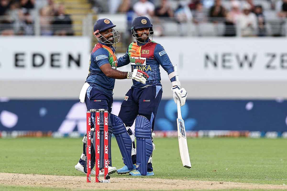 Sri Lanka's Charith Asalanka and Kusal Mendis celebrate winning the super over and the match during the first Twenty 20 international between New Zealand and Sri Lanka at Eden Park in Auckland on 2 April 2023