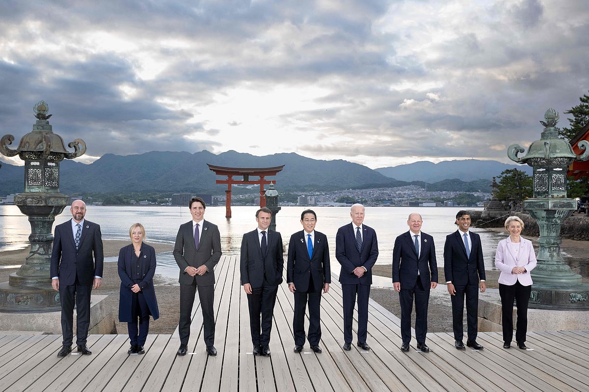 European Council President Charles Michel, Italy's Primer Minister Giorgia Meloni, Canada's Prime Minister Justin Trudeau, France's President Emmanuel Macron, Japan's Prime Minister Fumio Kishida, US President Joe Biden, German Chancellor Olaf Scholz, Britain's Prime Minister Rishi Sunak and European Commission President Ursula von der Leyen pose for the family photo during a visit to the Itsukushima Shrine in Miyajima Island as part of the G7 Leaders' Summit, on 19 May, 2023.