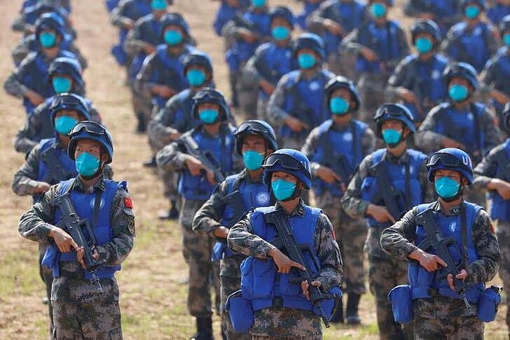 Soldiers of Chinese People's Liberation Army (PLA) take part in a joint multinational UN peacekeeping military exercise with troops from Pakistan, Mongolia and Thailand, on the outskirts of Zhumadian, Henan province, China on 15 September, 2021.
