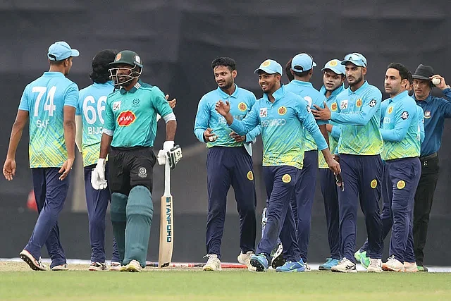 Abahani Limited players celebrate after their win over Mohammedan Sporting Club in the Super League match of the Dhaka Premier League at the Sher-e-Bangla National Cricket Stadium in Dhaka on 1 May 2023