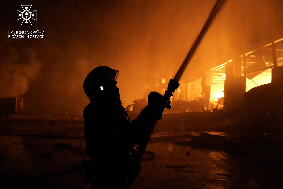 A firefighter works at the site where storage facilities were heavily damaged by a Russian missile strike, amid Russia's attack on Ukraine, in Odesa region, Ukraine May 8, 2023