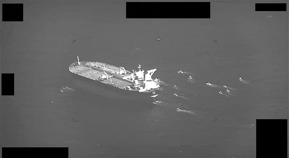 Fast-attack crafts from Iran's Islamic Revolutionary Guard Corps Navy swarming Panama-flagged oil tanker Niovi as it transits the Strait of Hormuz from Dubai to port of Fujairah in the United Arab Emirates, Arabian Gulf, are seen in this screenshot of a video provided by the US Navy on 3 May, 2023.