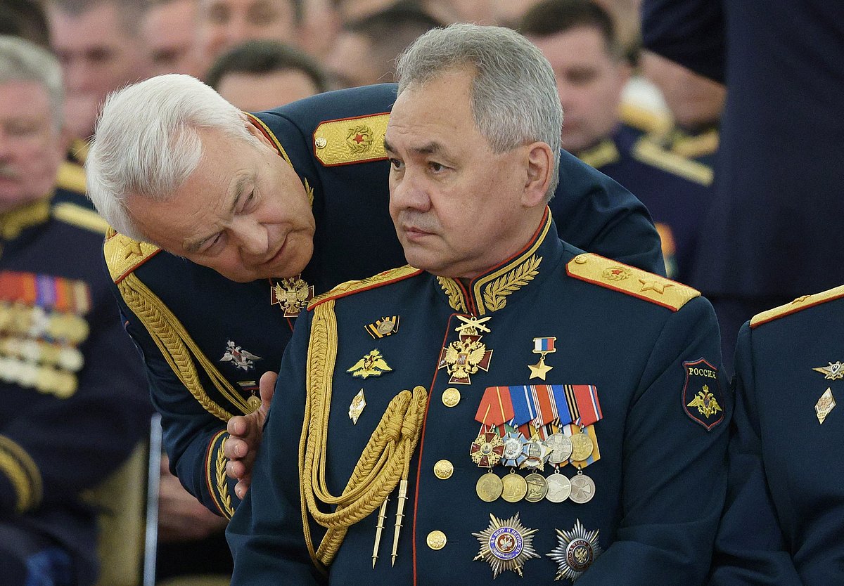 Russian Defence Minister Sergei Shoigu (R) attends a meeting with graduates of Higher military schools at the Kremlin in Moscow on 21 June 2023.