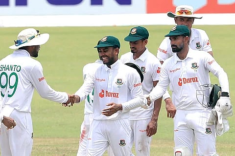 Bangladesh players all smiles after completing an emphatic win over Afghanistan in the one-off Test at the Sher-e-Bangla National Cricket Stadium in Dhaka on 17 June 2023