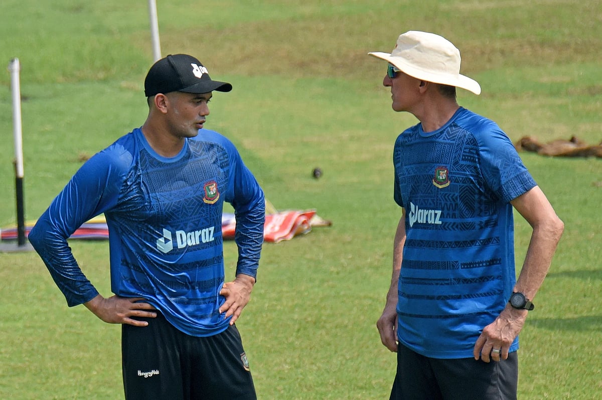 Bangladesh pacer Taskin Ahmed and fast bowling coach Alan Donald talks during a practice session at the Sher-e-Bangla National Cricket Stadium in Mirpur
