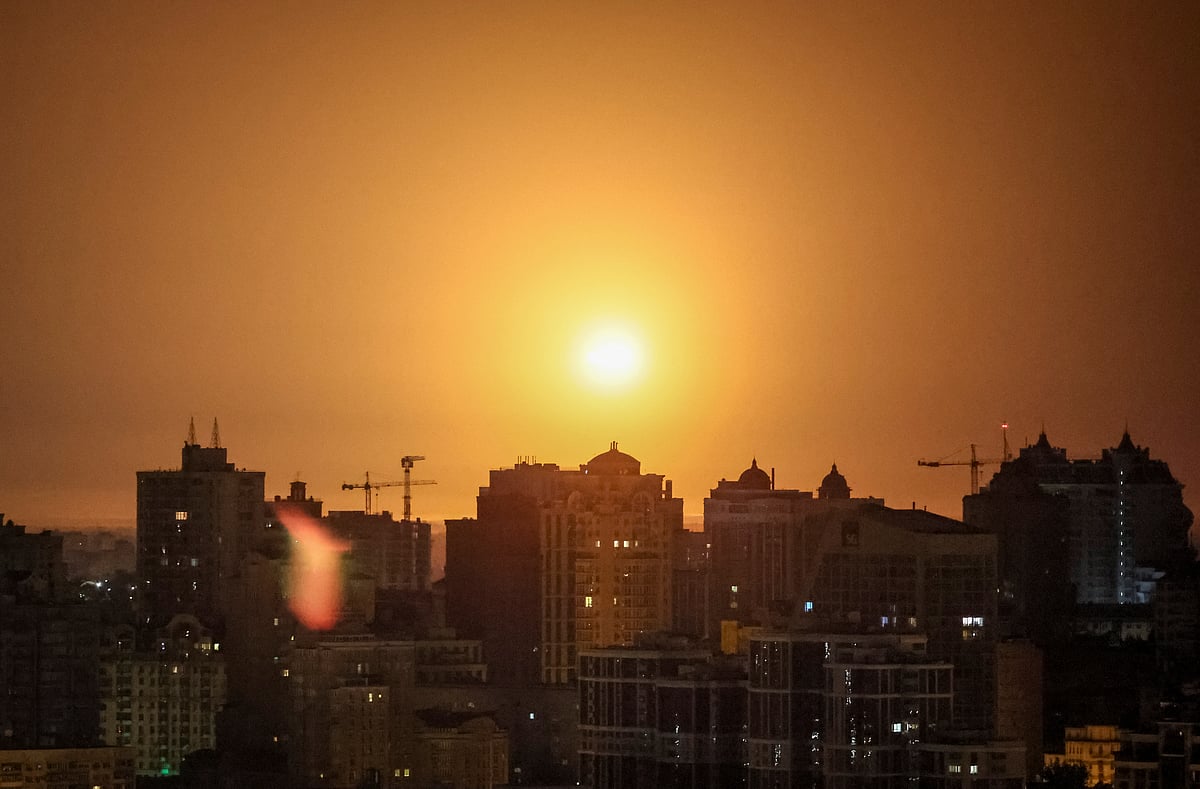 An explosion of a missile is seen in the sky over the city during a Russian missile strike, amid Russia's attack on Ukraine, in Kyiv, Ukraine 24 June 2023.