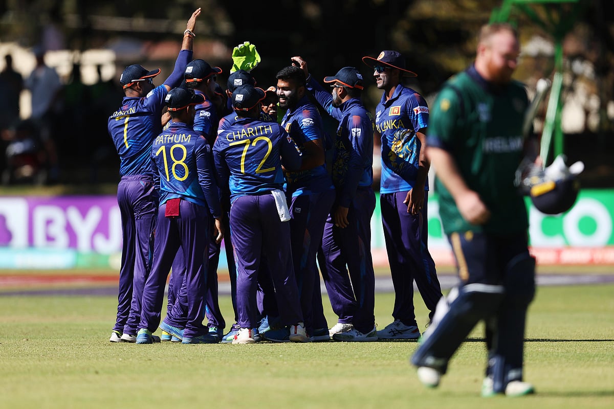 Sri Lankan players celebrate the wicket of Paul Stirling in ther ICC World Cup qualifier match in Zimbabwe on 25 June 2023