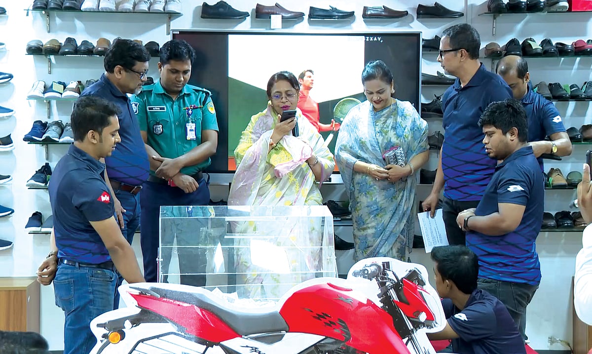 Parliament member Simeen Hossain and other dignitaries during the raffle draw ceremony of Lotto and Lee Cooper London mega Eid campaign “Koti Takar Offer”