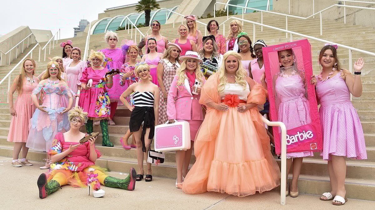 Barbie cosplayers pose outside the convention center during San Diego Comic-Con International in San Diego, California, on July 20, 2023
