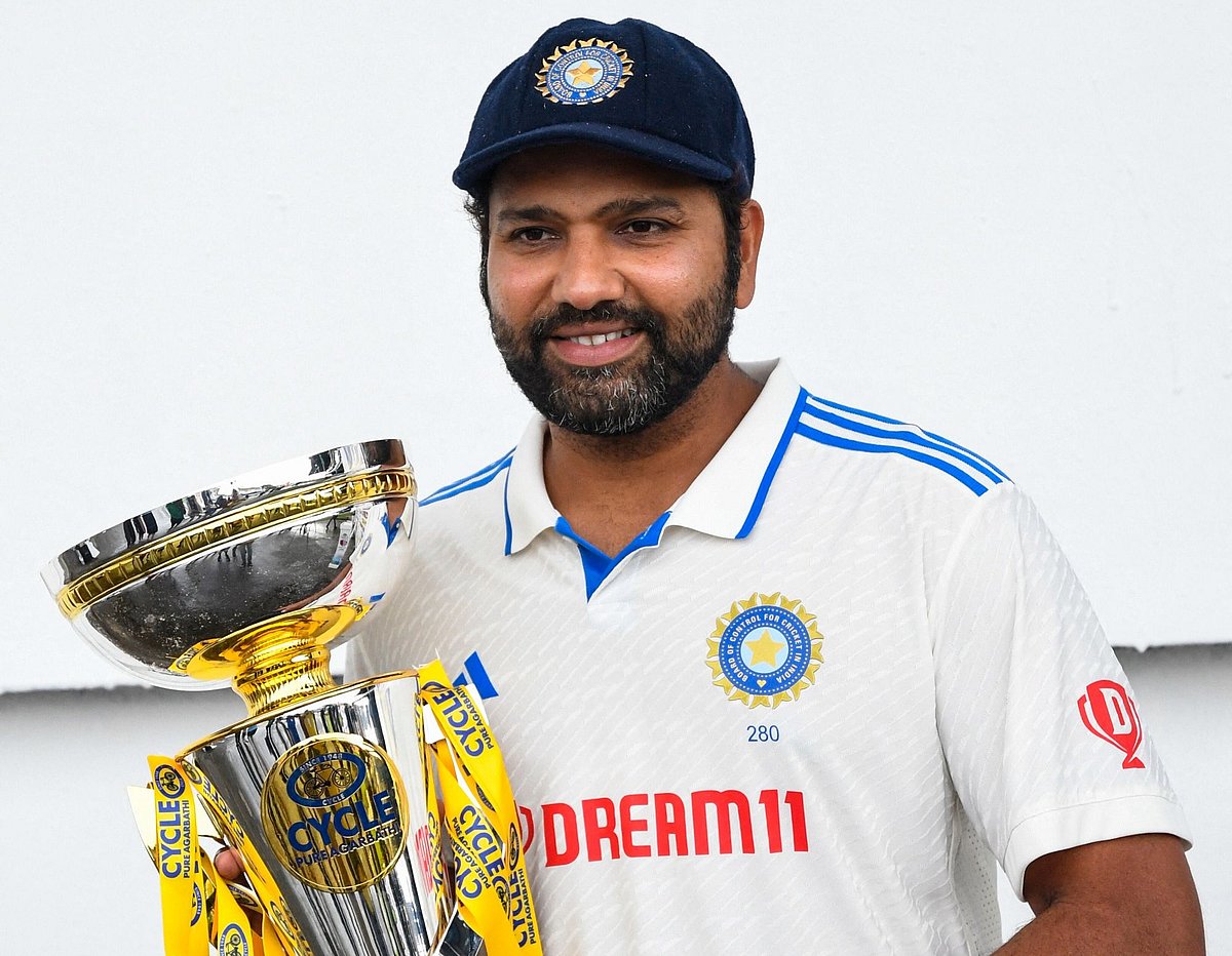 Rohit Sharma, of India, holds the winner's trophy at the end of the fifth and final day of the second Test between India and West Indies at Queen's Park Oval in Port of Spain, Trinidad and Tobago on 24 July 2023