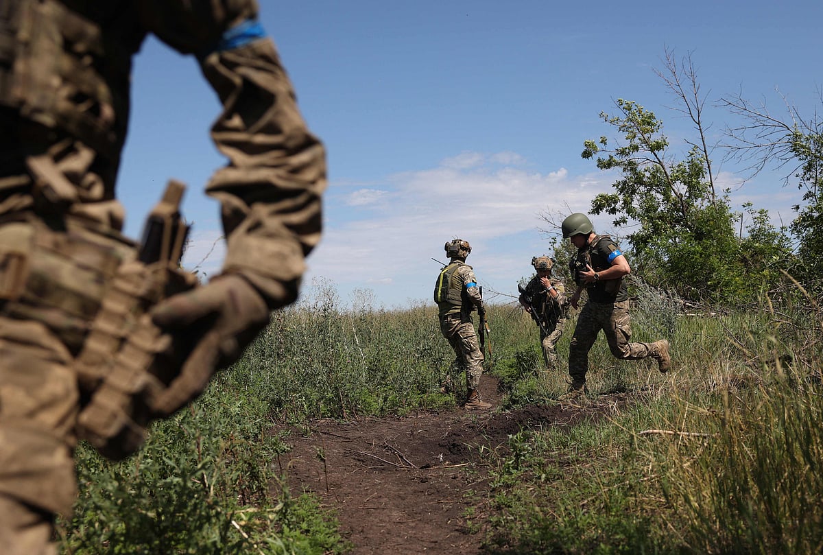 Ukrainian servicemen of 22th mechanized brigade operate at a recaptured position near Klyshchiivka village, south of Bakhmut, Donetsk region on 13 July, 2023