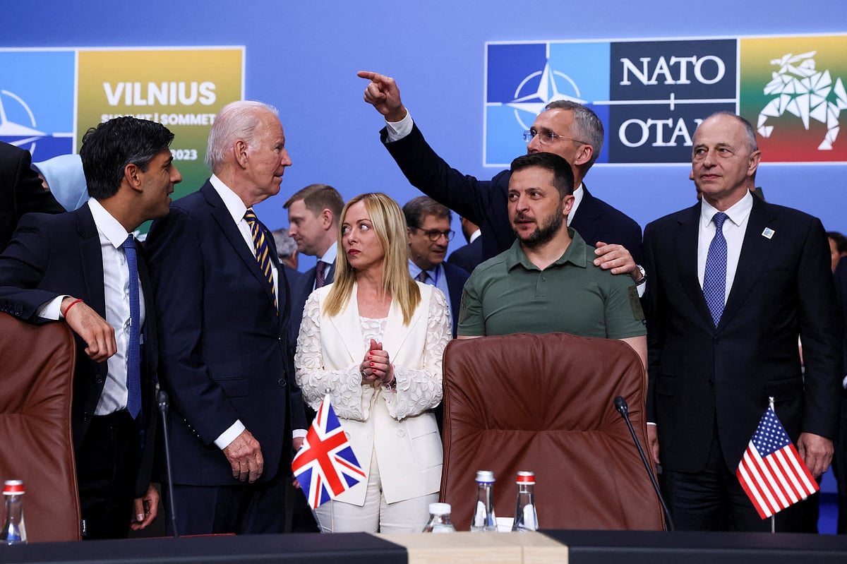Ukraine's President Volodymyr Zelenskiy, British Prime Minister Rishi Sunak, US President Joe Biden, Italian Prime Minister Giorgia Meloni and NATO Secretary-General Jens Stoltenberg attend a meeting of the NATO-Ukraine council, during a NATO leaders summit in Vilnius, Lithuania, 12 July, 2023