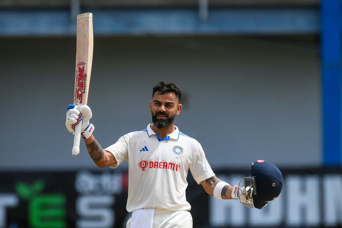 Virat Kohli of India celebrates his century during the second day of the second Test between India and West Indies at Queen's Park Oval in Port of Spain, Trinidad and Tobago on 21 July 2023