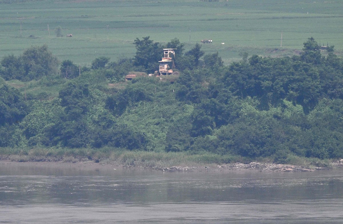 A North Korean guard post on the Demilitarised Zone (DMZ) is seen from South Korea's Odusan Unification Observatory in Paju on 19 July, 2023