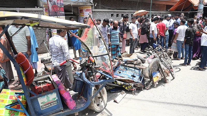 An auto-rickshaw is broken due to the accident that took place at Chashara area of Narayanganj city on Monday morning