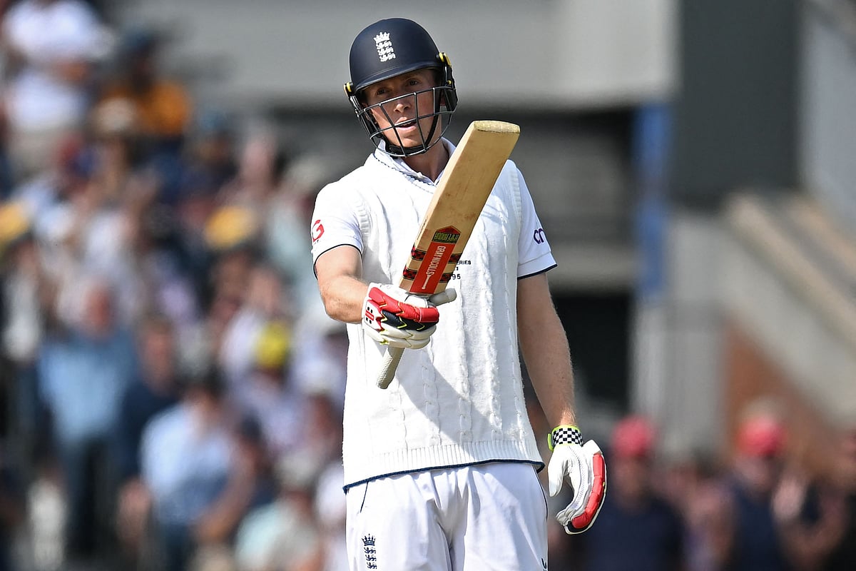 England's Zak Crawley celebrates reaching 150 not out on day two of the fourth Ashes cricket Test match between England and Australia at Old Trafford cricket ground in Manchester, north-west England on 20 July, 2023