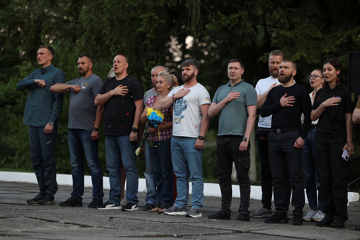 Commanders of defenders of the Azovstal Iron and Steel Works in Mariupol Denys Prokopenko, Sviatoslav Palamar, Denys Shleha, Serhii Volynskyi and Oleh Homenko sing a national anthem after their return from Istanbul, amid Russia's attack on Ukraine, in Lviv, Ukraine July 8, 2023