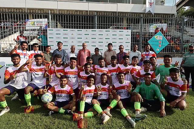 CCN Science and Technology University team's players pose for a photo with the dignitaries after the Cumilla phase matches at the Shaheed Dhirendranath Dutta Stadium in Cumilla on 16 July 2023