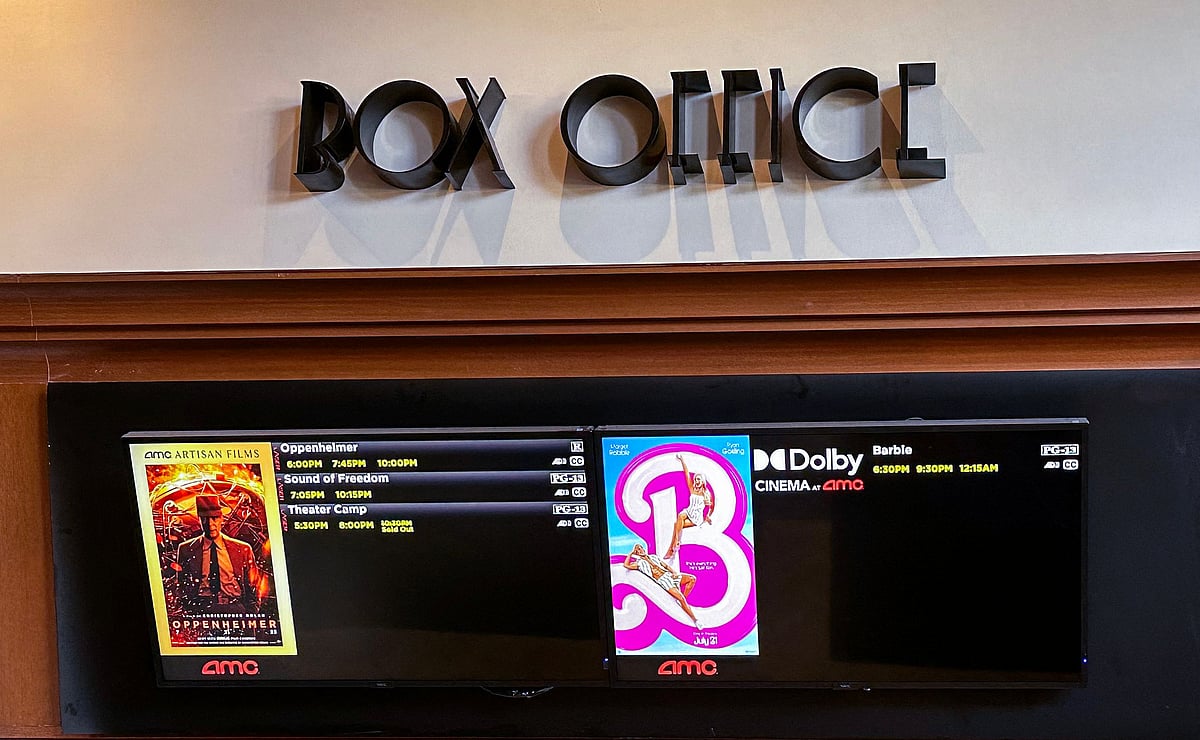 A movie theater Box Office is pictured announcing the opening of 'Oppenheimer' and 'Barbie' movies, in Los Angeles California, on 20 July, 2023. 'Oppenheimer' is facing off against 'Barbie' in the biggest clash of Hollywood summer blockbusters, with both opening on the same day in a duel the media has dubbed "Barbenheimer".