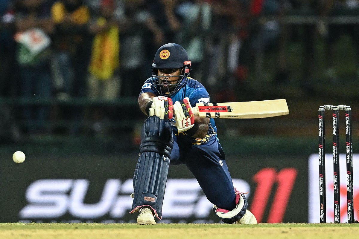 Sri Lanka's Charith Asalanka plays a shot during the Asia Cup 2023 match between Sri Lanka and Bangladesh at the Pallekele International Cricket Stadium in Kandy on 31 August 2023
