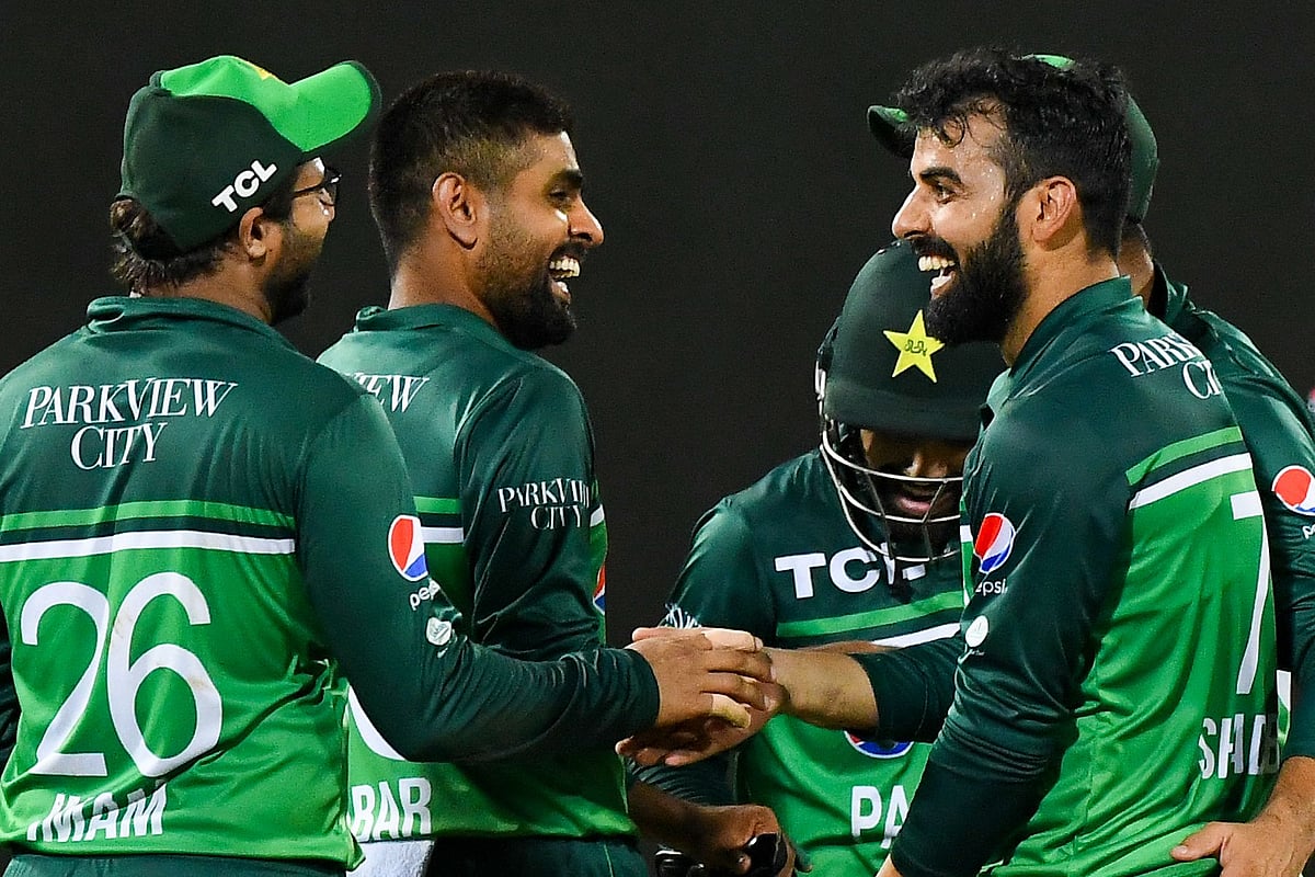 Pakistan's captain Babar Azam celebrates with teammates after the dismissal of Afghanistan's Hashmatullah Shahidi during the third and final ODI between Pakistan and Afghanistan at the R. Premadasa Stadium in Colombo on 26 August 2023