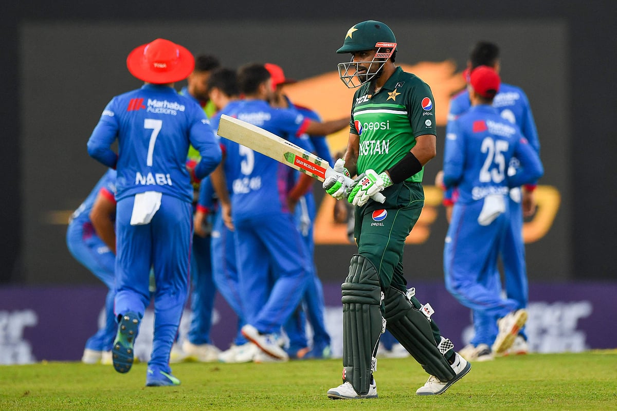 Pakistan's Babar Azam walks back to the pavilion after his dismissal during the third and final one-day international (ODI) cricket match between Pakistan and Afghanistan at the R. Premadasa Stadium in Colombo on 26 August, 2023