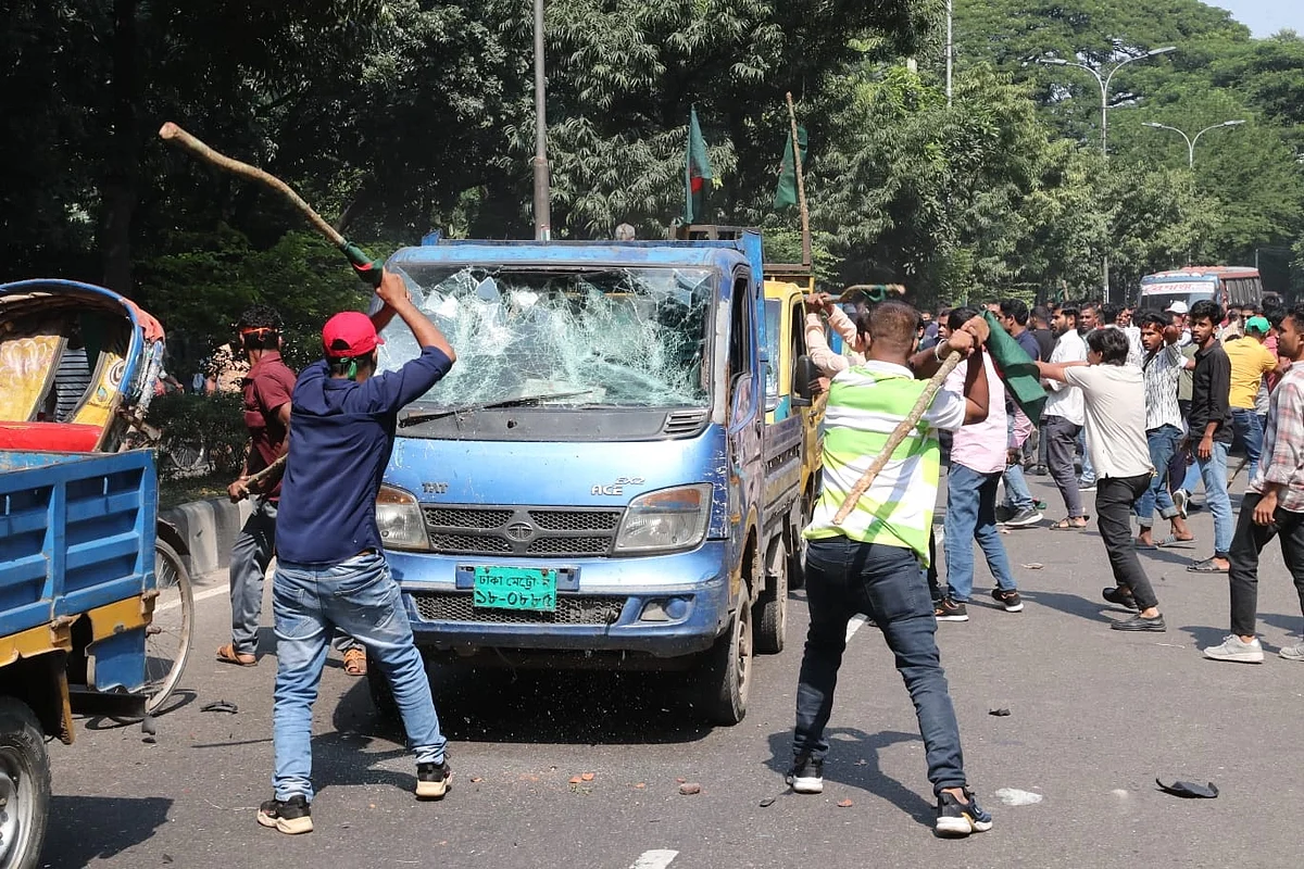 A pickup van is vandalised during the clashes between the leaders and activists of Awami League and Bangladesh Nationalist Party (BNP) in Kakrail, Dhaka on 28 October 2023.