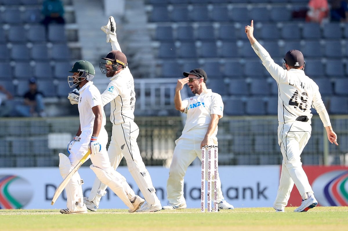 New Zealand players celebrate as Bangladesh’s Mahmudul Hasan departs during their first Test of the two-match series at the Sylhet International Cricket Stadium on 28 November 2023.