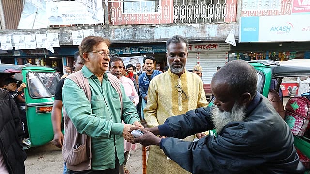 Shamsher Mobin Chowdhury, the chairman of Trinamool BNP, conducts mass campaign at Amnia Bazar in Golapganj of Sylhet on 29 December, 2023.