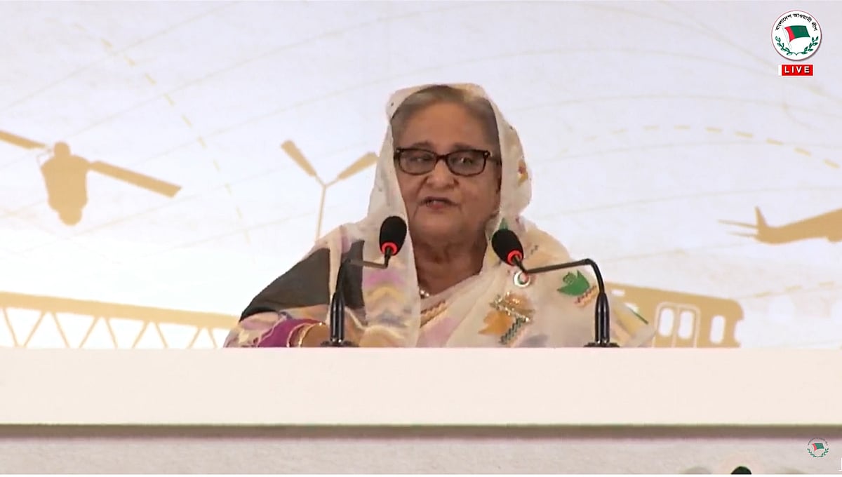 Bangladesh Awami League president and Prime Minister Sheikh Hasina reads out the party's manifesto for the forthcoming 12th parliamentary elections on 27 December in 2023
