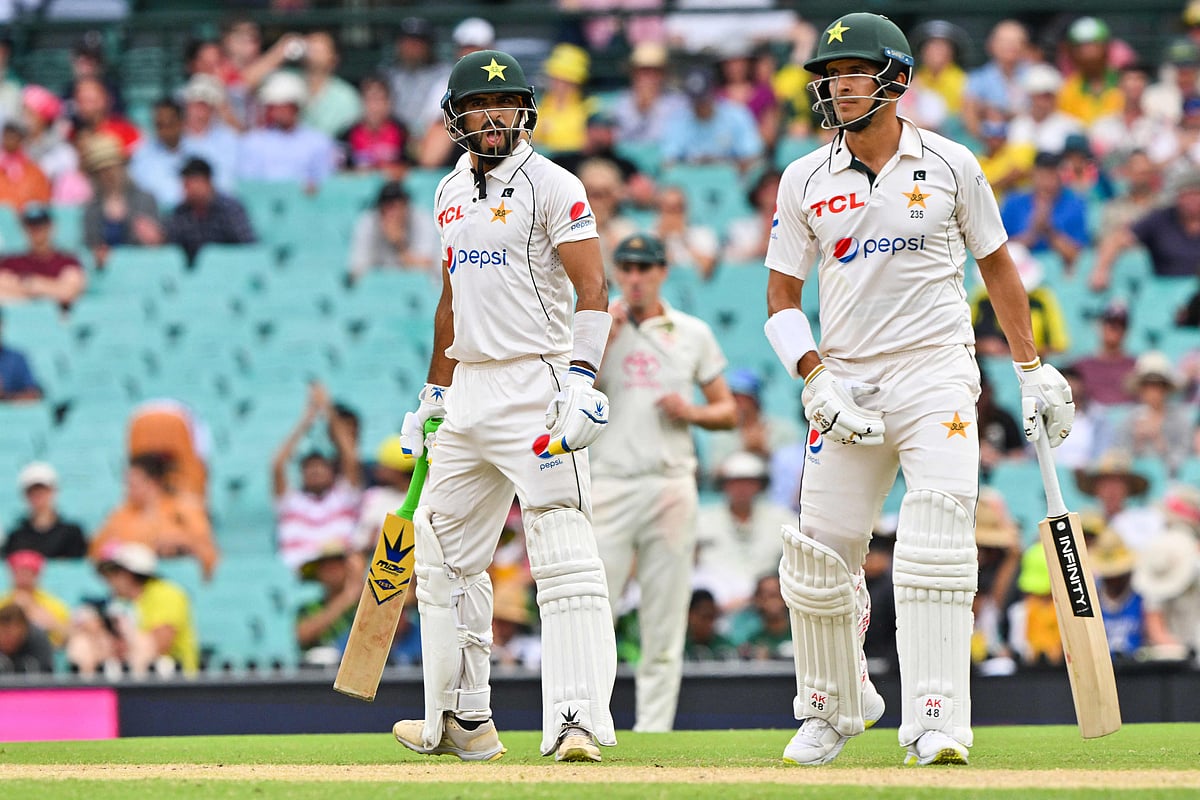 Pakistan’s Aamer Jamal (L) reacts during the first day of the third cricket Test match between Australia and Pakistan at the Sydney Cricket Ground in Sydney on 3 January 2024