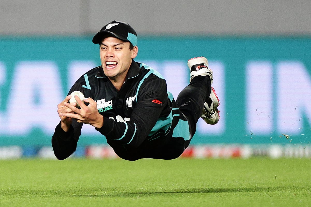 New Zealand’s Mark Chapman catches Pakistan's Haris Rauf to win the first Twenty20 international cricket match between New Zealand and Pakistan at Eden Park in Auckland on 12 January, 2024.