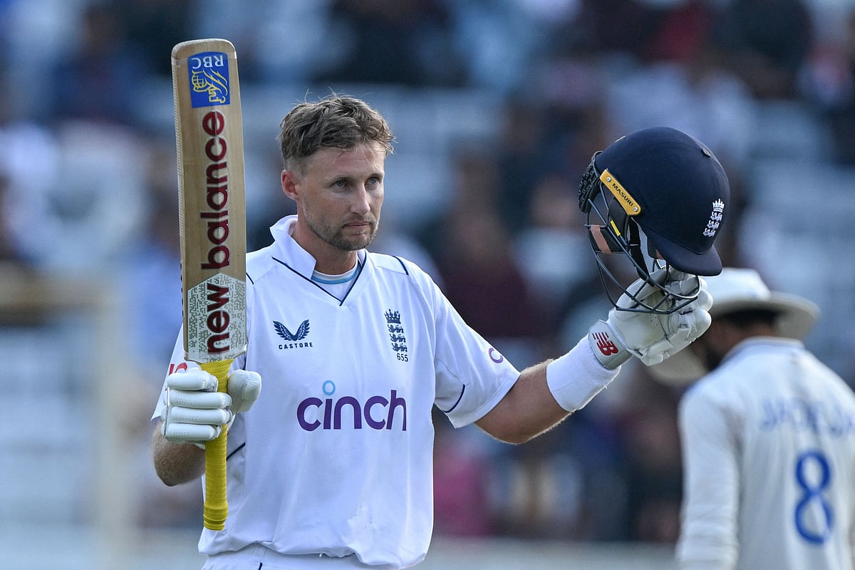 England's Joe Root celebrates after scoring a century (100 runs) during the first day of the fourth Test cricket match between India and England at the Jharkhand State Cricket Association (JSCA) Stadium in Ranchi on 23 February, 2024.