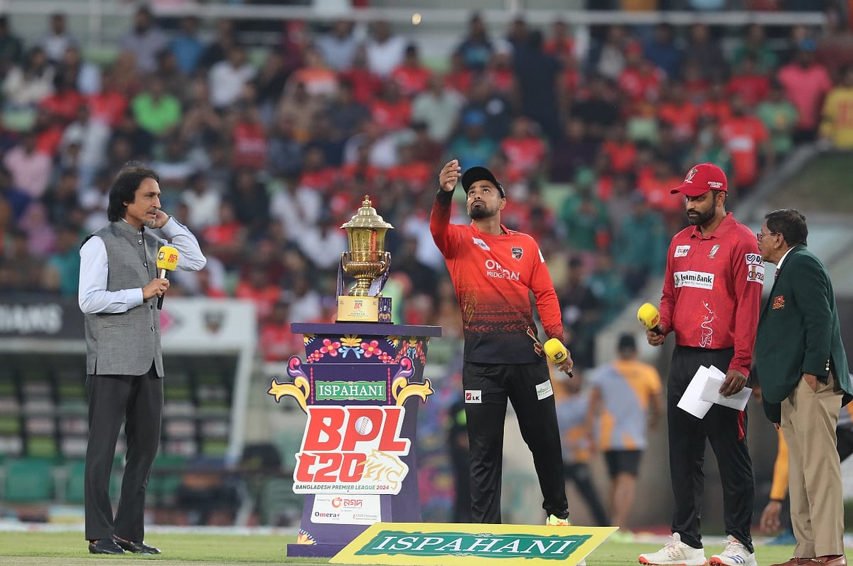 Comilla Victorians skipper flips the coin while Fortune Barishal skipper Tamim Iqbal is seen next to him during the toss of the final of the Bangladesh Premier League at Sher-e-Bangla National Cricket Stadium, Mirpur in Dhaka on 1 March 2024.