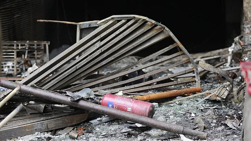 Burnt remnants of the seven-storey building on Bailey Road in the capital. Photo taken on Friday, 1 March morning.