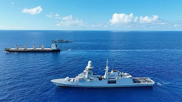 A picture showing two warships of EU Naval Force escorting Bangladeshi vessel MV Abdullah
