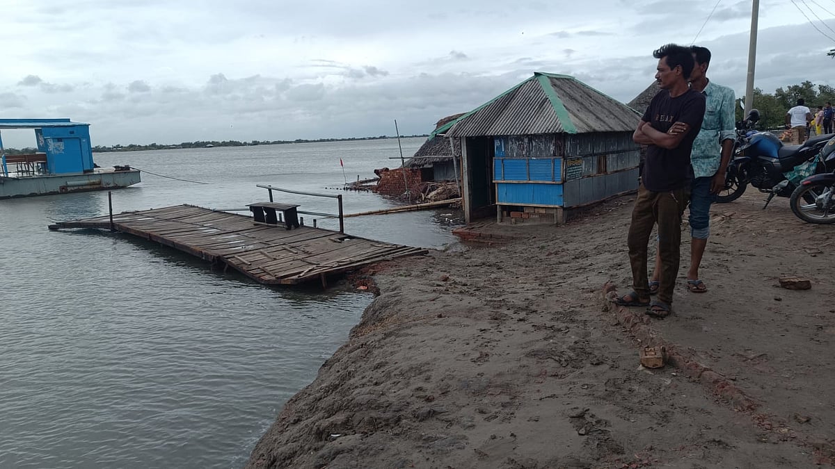 A man looks at the Kopotakkho River in Modinabad of Koyra, adjacent to the Sundarbans, in Khulna on 26 May 2024.