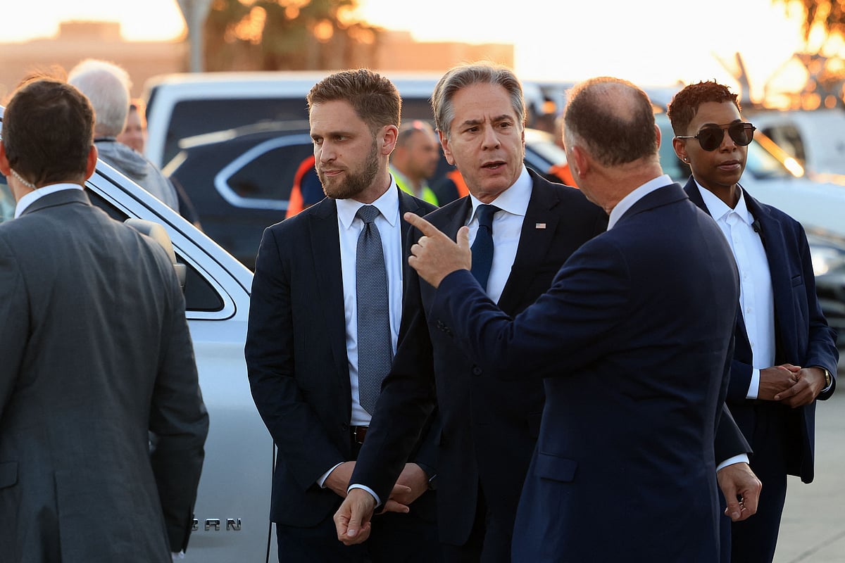 US Secretary of State Antony Blinken (Centre-R) looks on after his arrival in Tel Aviv on August 18, 2024