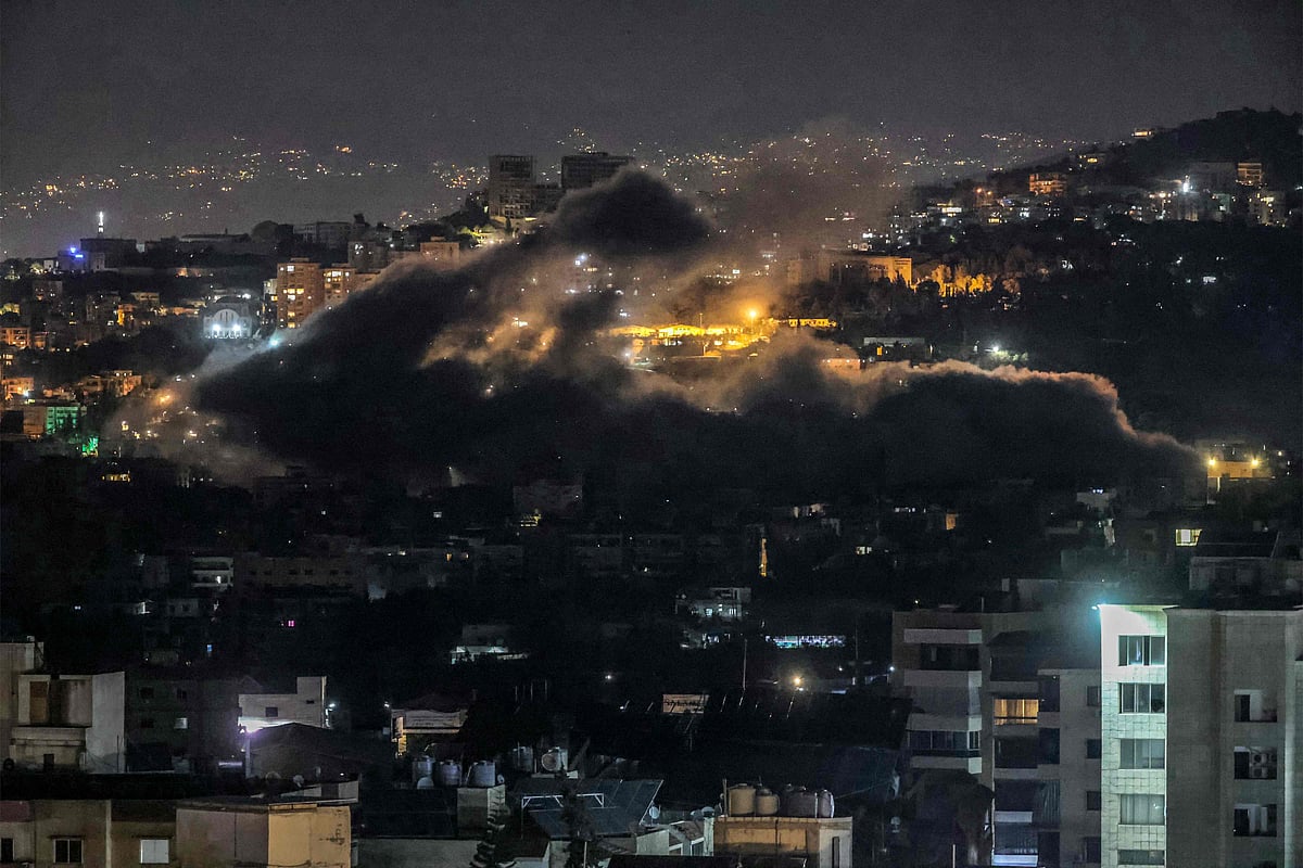 Smoke rises from the site of an Israeli air strike on a neighbourhood in Beirut’s southern suburbs on 24 October, 2024. Israel expanded operations in Lebanon nearly a year after Hezbollah began exchanging fire in support of its ally, Hamas, following the Palestinian group's deadly attack on Israel on 7 October, 2023.