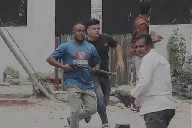 Jubo League activist Touhidul in action while attacking the protesters in the Bahaddarhat area of Chattogram on 18 July 2024.