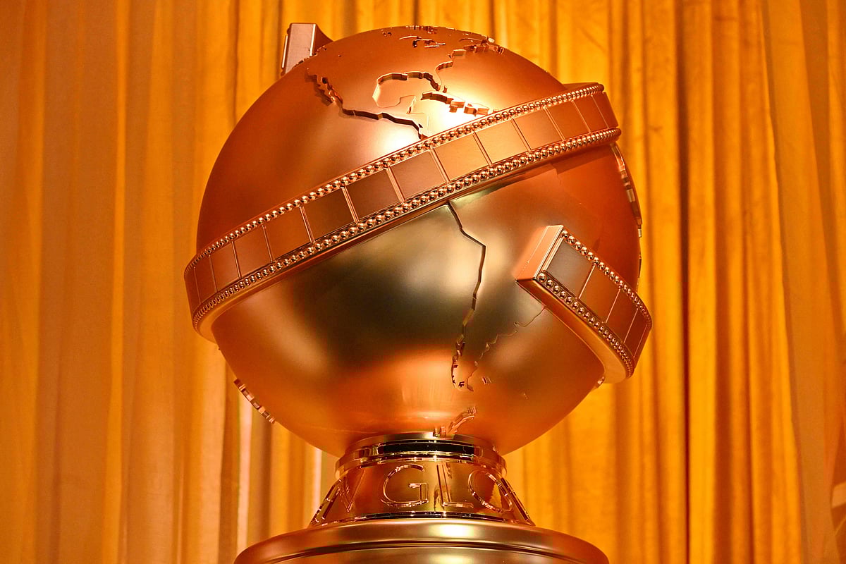 A Golden Globes statue is seen in the ballroom during preparations for the 82nd Annual Golden Globe Awards at the Beverly Hilton hotel in Beverly Hills, California, 2 January, 2025.