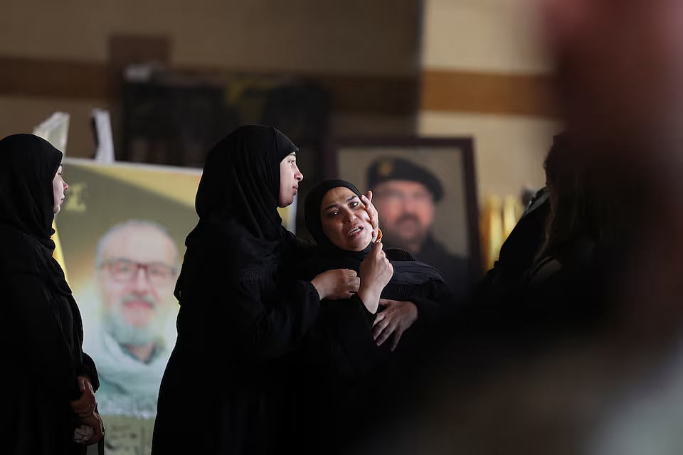Women mourn during the funeral of Ghassan Najjar, a cameraman at Al Mayadeen news outlet who was killed in an Israeli strike with two other journalists in the southern Lebanese town of Hasbaya, in Beirut’s southern suburbs, Lebanon 26 October, 2024.