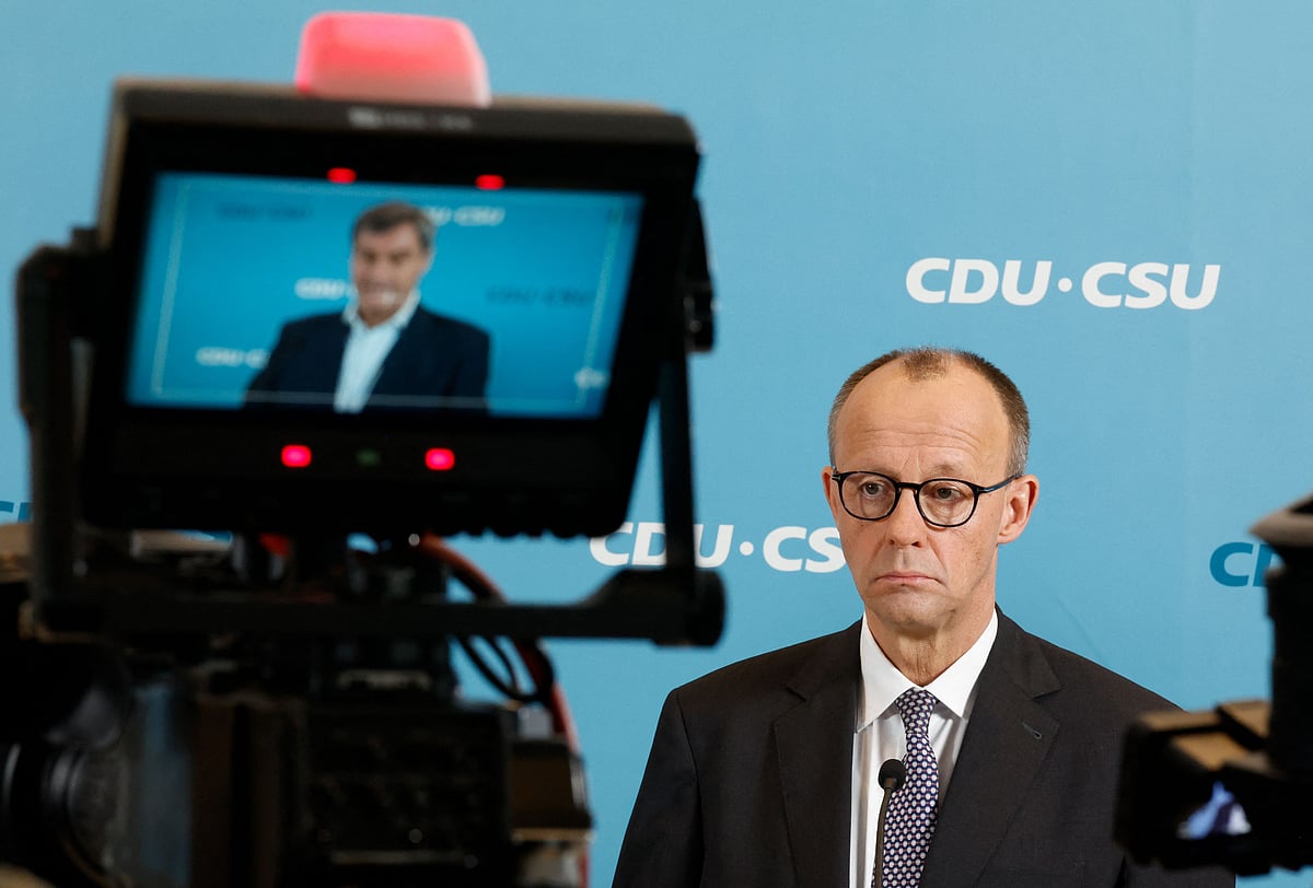 The leader of Germany's conservative Christian Democratic Union (CDU) Friedrich Merz (R) and Bavaria's State Premier and the leader of the CDU's Bavarian sister party, the Christian Social Union (CSU) Markus Soeder (L), displayed on the camera screen), give a statement prior to the first meeting of their parties' parliamentary groups following elections, on 25 February 2025 in Berlin.