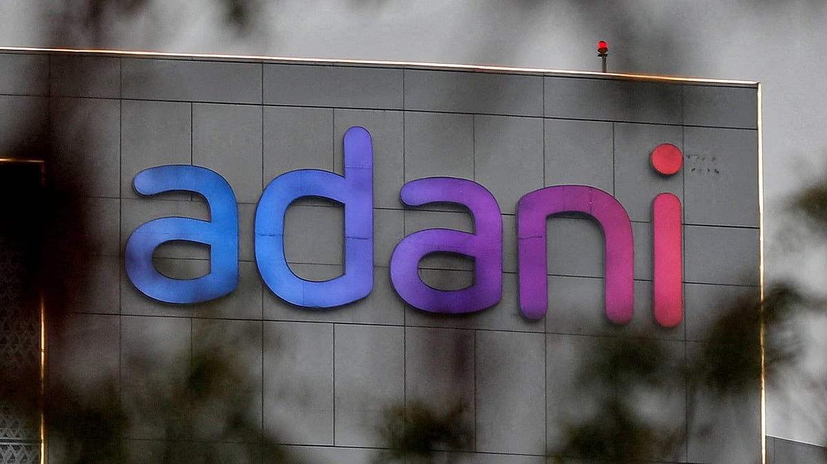The logo of the Adani Group is seen on the facade of its Corporate House on the outskirts of Ahmedabad, India, 27 January 2023.